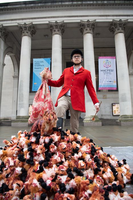 Hunter and fake bloodied foxes in Manchester